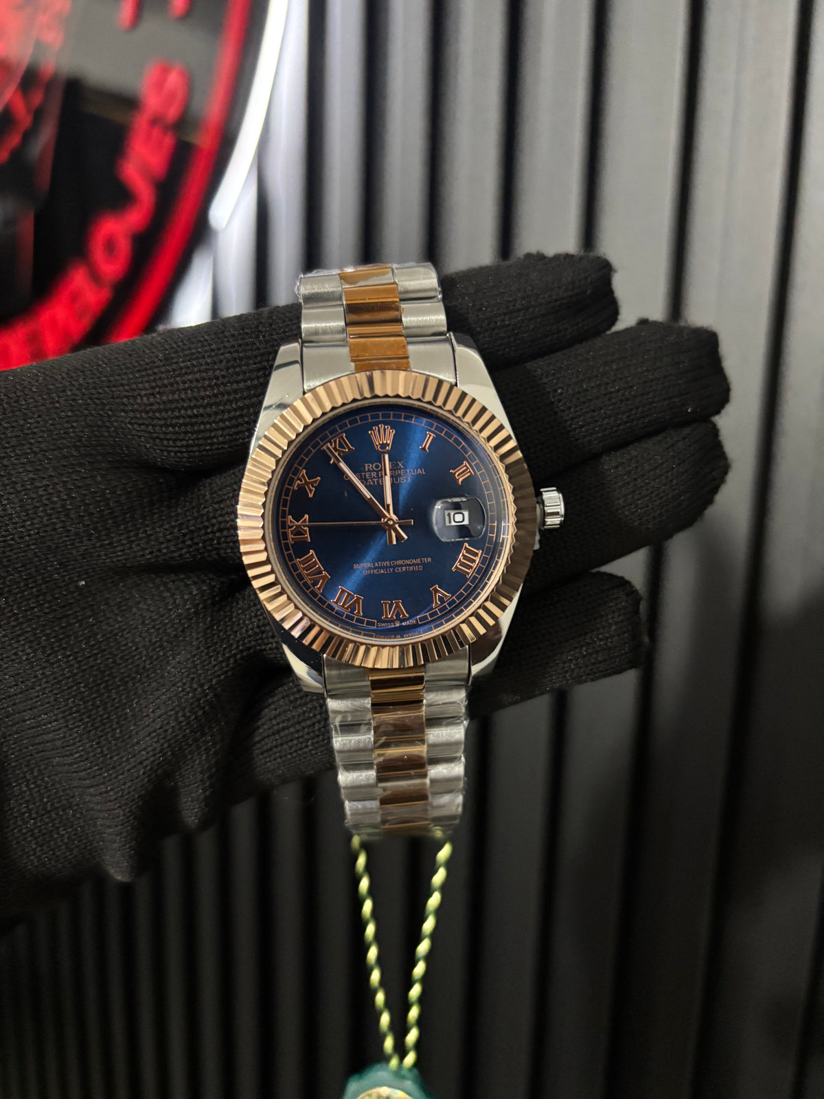 Rx roman bicolor oro rosa fondo azul oscuro