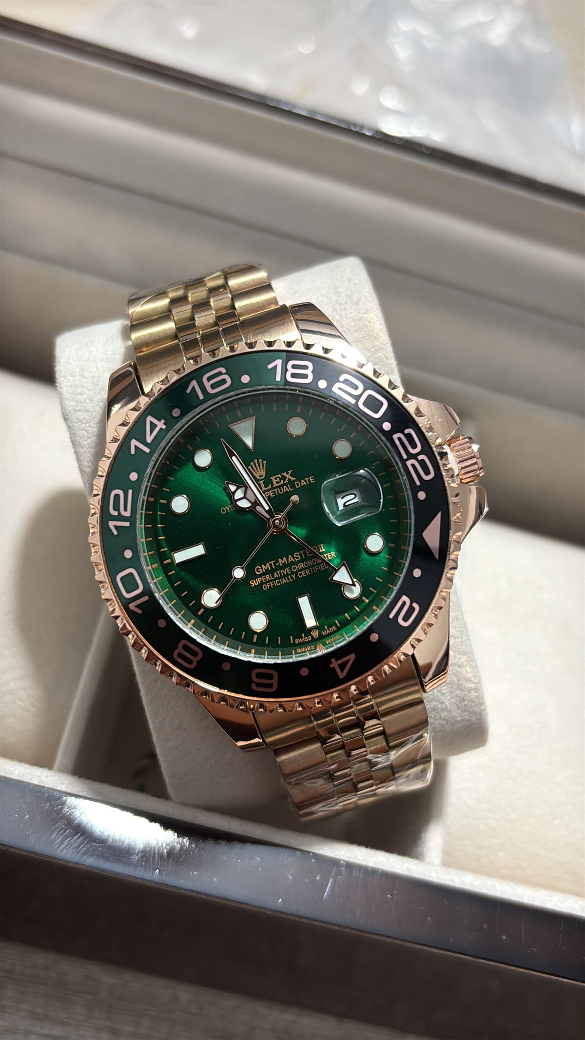 RX GM2 oro rosa bisel negro verde fondo verde