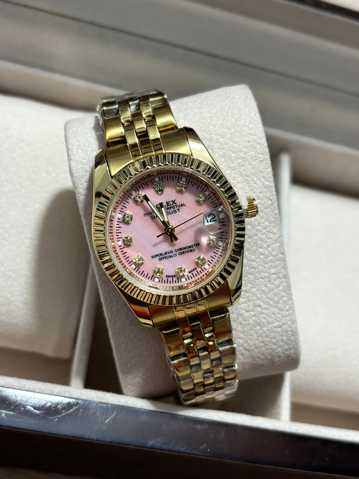 RX DAMA dorado fondo rosa