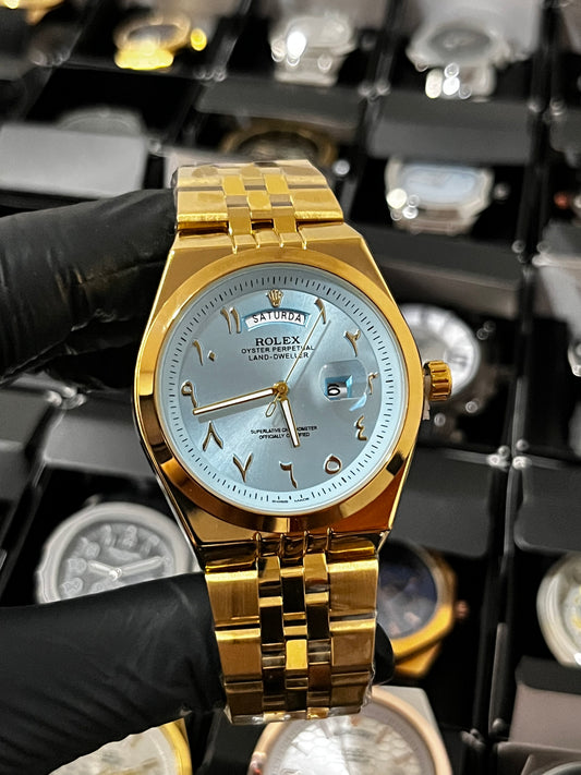 RX LANDWR ARAB / DORADO FONDO AZUL CLARO