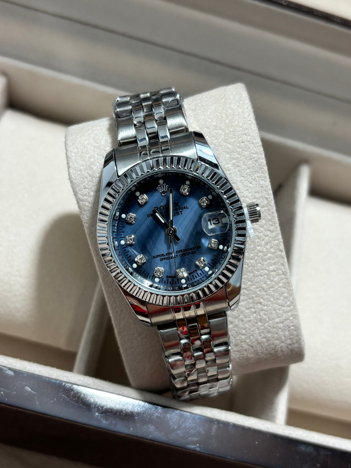 RX DAMA plateado fondo azul