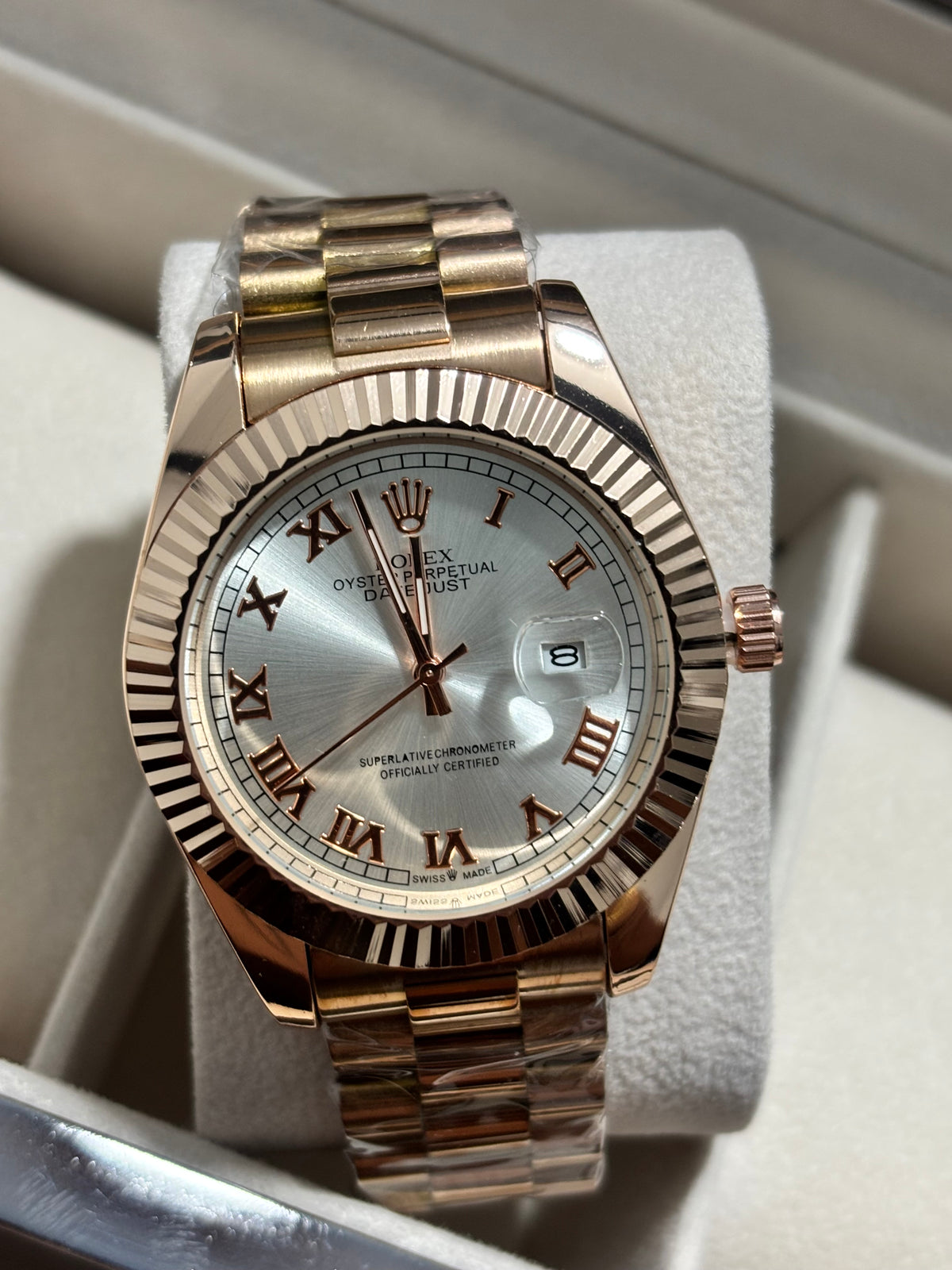 Rx roman oro rosa fondo plateado
