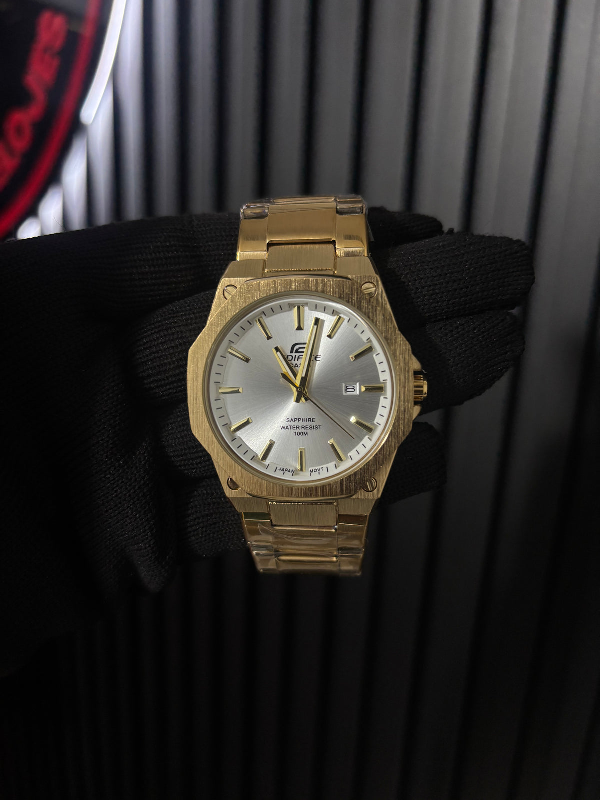 CSO EDIFIC ACERO dorado fondo plateado