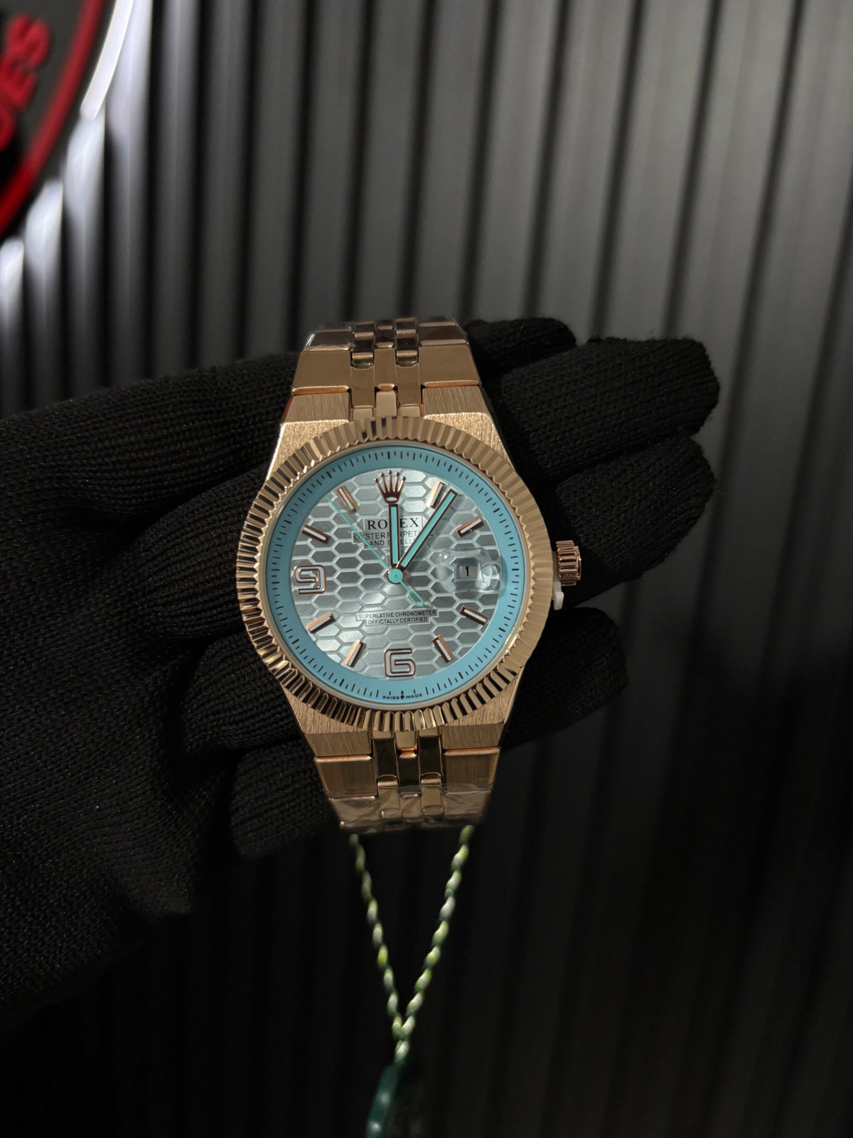 Rx landwr r963 oro rosa fondo azul claro