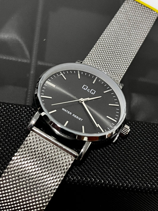 Q&Q ACERO/PLATEADO/TRENZADO TABLERO/NEGRO BISEL/PLATEADO